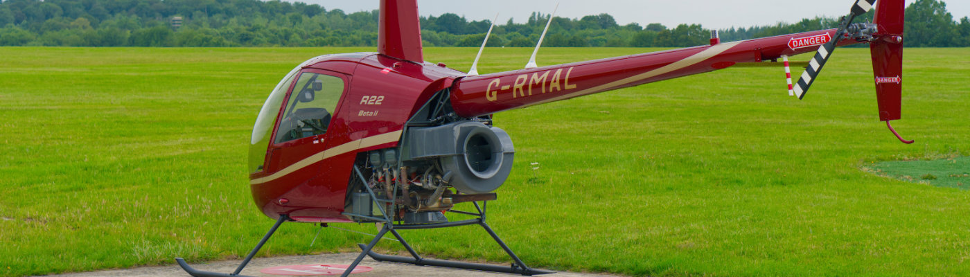 2 seater R22 Beta II piston helicopter built by Robinson Helicopters